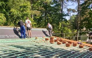 travaux de rénovation de toit en pente